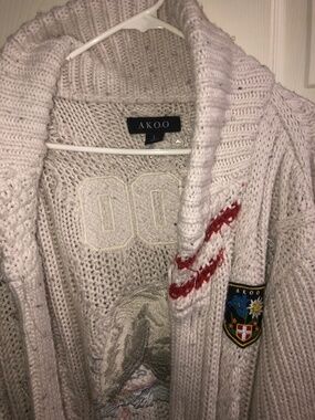 Akoo cardigan sweater used size L